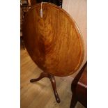 A late George III mahogany circular tilt top tea table Diameter 86cm