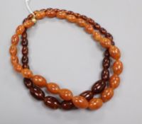 Two simulated amber bead necklaces.