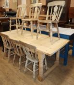 A Victorian style rectangular pine kitchen table and six Victorian elm and beech Windsor kitchen