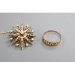 An Edwardian 15ct and seed pearl set starburst brooch and a Victorian 9ct and seed pearl ring.