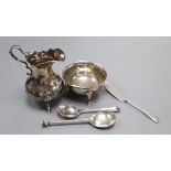 A Victorian silver cream jug, London, 1844, a later silver sugar bowl and three items of silver