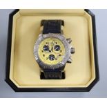 A gentleman's 2004 stainless steel Breitling Chronometre quartz wrist watch, with yellow dial and