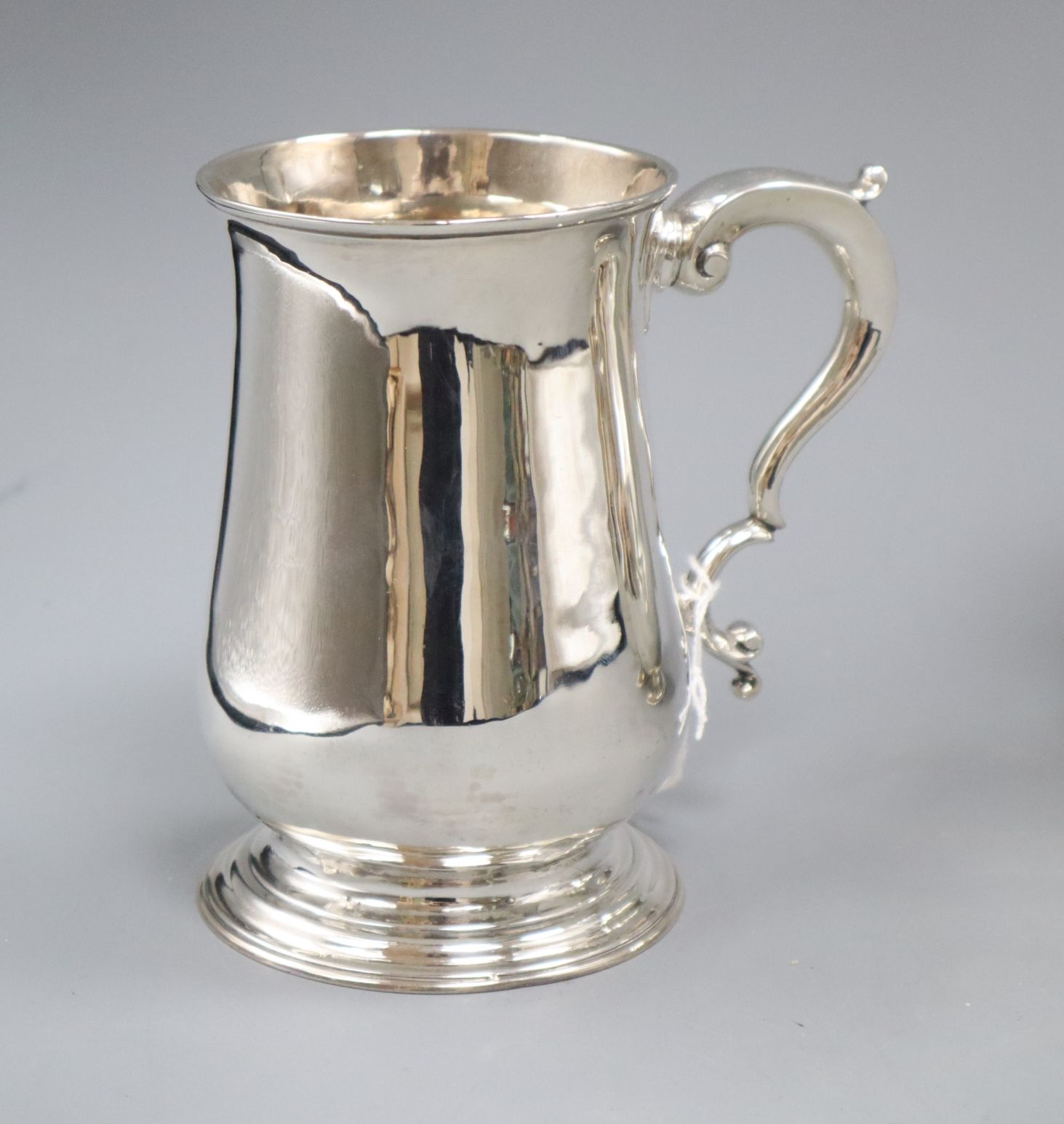 A George III silver baluster mug, Joseph Steward, London, 1767, (repaired), 13cm, 9 oz.