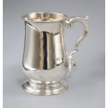 A George III silver baluster mug, Joseph Steward, London, 1767, (repaired), 13cm, 9 oz.