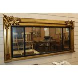 A Victorian gilt and carved wood three plate overmantel mirror W.139cm