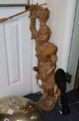 A large carved wood figure of a native American and an African tribal wood figure tallest 93cm