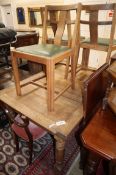A 1920's oak draw leaf dining table and four chairs table 230cm extended
