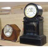 A late 19th century French ebonised mantel clock and a later oak mantel clock tallest 41cm