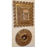 An ornate gilt cushion frame wall mirror and another Larger H.55cm