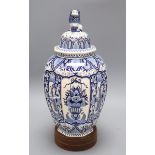 A Delft blue and white lidded vase, with wooden stand height 41cm excl. stand