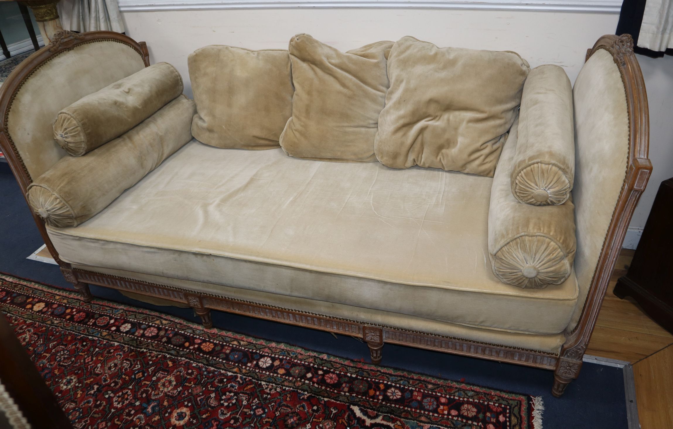 A French carved beech day bed W.184cm