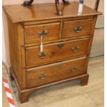 A George III style oak chest of drawers W.84cm