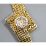 A stylish yellow metal and diamond set dress bracelet watch, 18.5cm.