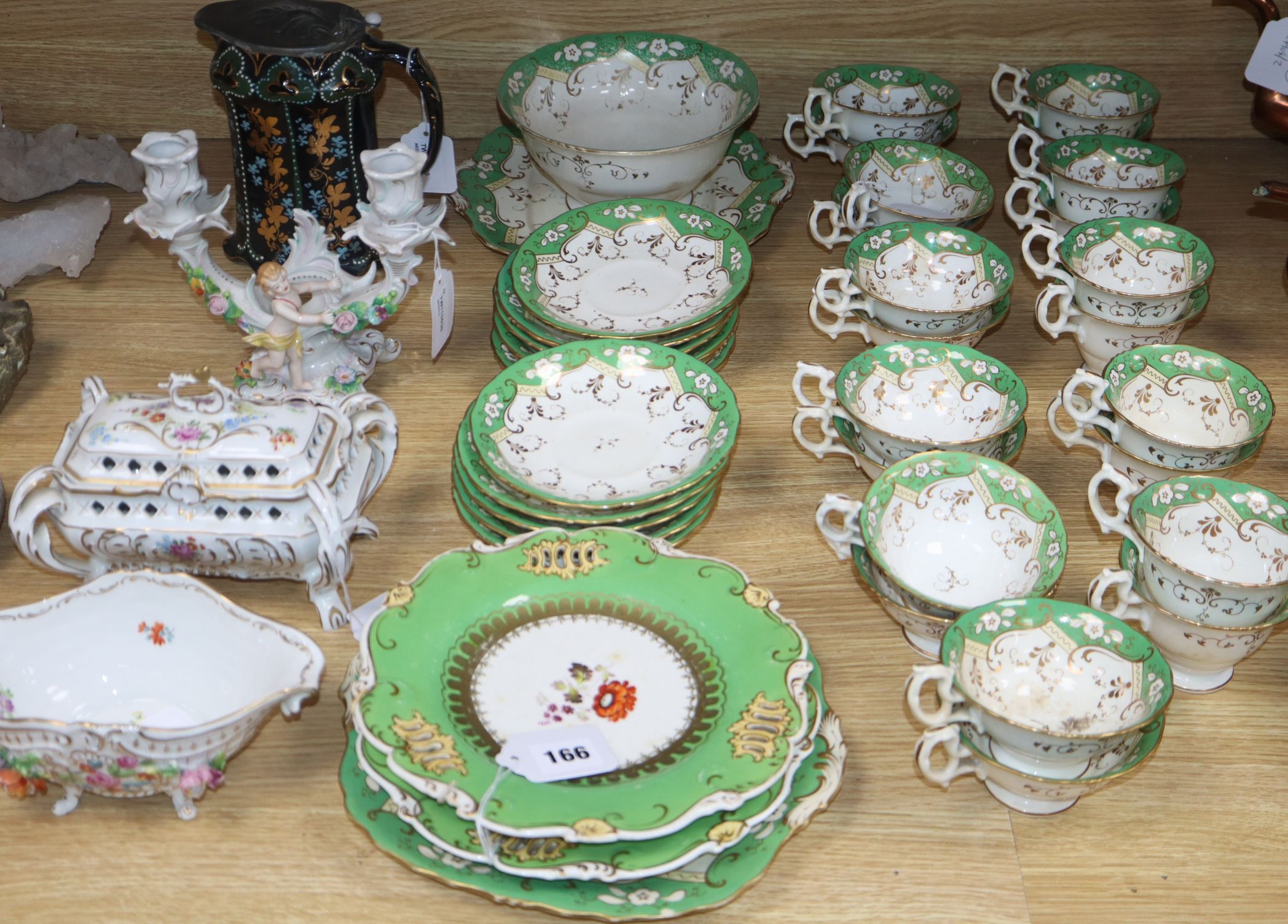 A Plaue Schierholz porcelain box and cover, a Sitzendorf cherub-mounted candelabrum and sundry