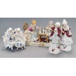 A French porcelain conversation group and three other pieces
