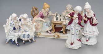 A French porcelain conversation group and three other pieces