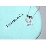 A modern Paloma Picasso for Tiffany & Co 18ct white gold and diamond set pendant necklace, pendant