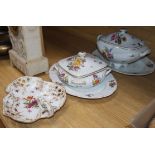 Two German porcelain floral painted tureens, two meat dishes and a shaped dish (5)