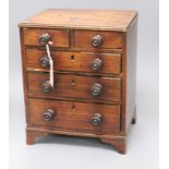 An apprentice mahogany chest of drawers height 33cm