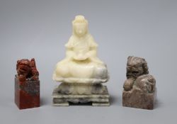 Three Chinese soapstone figures or seals of Guanyin and two Buddhist lions tallest 18cm