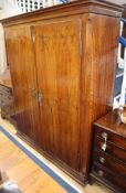 A 19th century German walnut armoire W.148cm