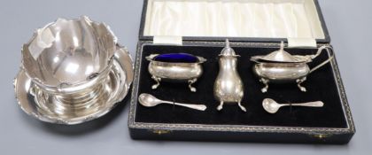 A George V silver small bowl with stand, Docker & Burn?, Birmingham, 1930 and a later cased three