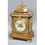 A late 19th century French cast brass mounted rosewood eight day mantel clock height 43cm