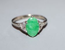 A 1920's? 18ct white meat and Plat and jadeite ring with diamond set shoulders (setting a.f.),