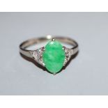 A 1920's? 18ct white meat and Plat and jadeite ring with diamond set shoulders (setting a.f.),