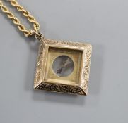 A late Victorian engraved 9ct gold mounted compass pendant, on a later 9k ropetwist chain, compass