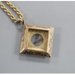 A late Victorian engraved 9ct gold mounted compass pendant, on a later 9k ropetwist chain, compass