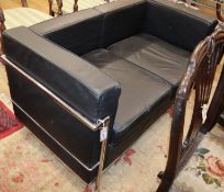 A Corbusier style black leather and chrome two seater sofa W.128cm