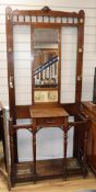 An Edwardian walnut hallstand W.92cm