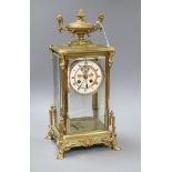 A French gilt brass four glass mantel clock, with mercury pendulum height 42cm