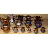 A group of Staffordshire copper lustre jugs