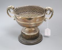 A modern silver two handled rose bowl, Walker & Hall, Sheffield, 1962, on ebonised socle, height