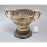 A modern silver two handled rose bowl, Walker & Hall, Sheffield, 1962, on ebonised socle, height