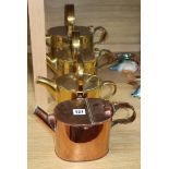 Three brass watering cans and a similar copper watering can