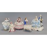 Five Dresden, Irish Dresden and other small lace figures, comprising a group of a couple singing and