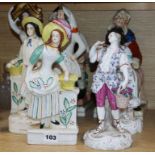 A pair of French porcelain figures and five Staffordshire figures (7)