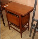 An Edwardian walnut card table, fitted side folding tiers W.70cm