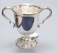 A George VI silver two handled pedestal trophy cup, Atkin Brothers, Sheffield,1937, 14.3cm, 10 oz.