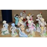 A set of twelve Royal Worcester figures of the seasons by Freda Doughty