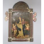 A Mexican Retablo icon on zinc, framed overall length 38.5cm