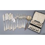 A set of six pairs German 800 fish eaters, a cased set of silver coffee spoon and a continental