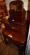 A Victorian mahogany duchess dressing table W.102cm