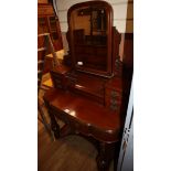 A Victorian mahogany duchess dressing table W.102cm