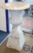 A pair of Victorian style painted campana garden urns on stands H.108cm