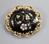 A 19th century yellow metal, black enamel and seed pearl set mourning brooch, in memory of
