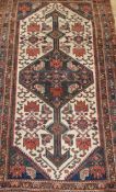 A Caucasian ivory ground rug 190 x 107cm approx.